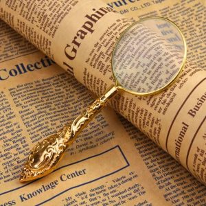 lupa aumento vintage dourada